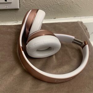 Rose Gold and White Wireless Headphones